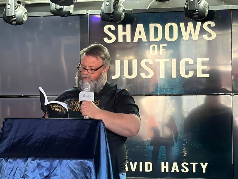 Reading from Shadows of Justice